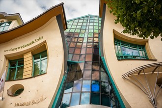 The Crooked House (Krzywy Domek) on Monte Cassino Street., Sopot. Unusual shaped building, built in 2004, designed by architects Szotynscy & Zaleski