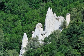 The Pyramids of Euseigne in the canton of Valais, Switzerland. Rocks of harder stone stacked on top