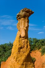 Rustrel France Provence Vaucluse sienna rock ocher erosion cliff sculptures cliff pillars trees wood forest,