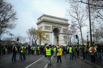Paris, France - 8 December 2018: Yellow Vests (Gilets jaunes) protests against living costs and rising oil prices