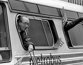 A former American hostage held by Iran waves from a buses during a welcome home parade along Pennsylvania Avenue January 27, 1981 in Washington, DC. Fifty-two Americans were held hostage for 444 days ...