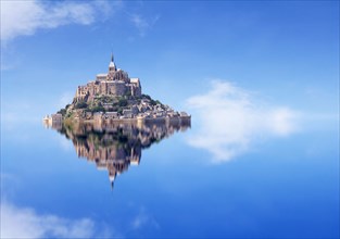 Le Mont Saint Michel, an UNESCO world heritage site in France, with reflection