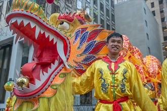 Dragon handler dressed in costume at San Francisco Chinese New Year parade.
