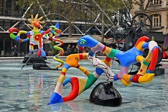 Modern sculpture at the fountain of Place Igor Stravinsky, outside the Centre Pompidou, Paris France.