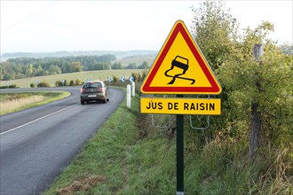 Jus de Raisin - road sign in France during the grape picking season