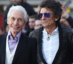 London, UK. 4th April, 2016. Charlie Watts and Ronnie Wood of the Rolling Stones at Exhibitionism Opening Night Gala at Saatchi Gallery in London. 4th April 2016.

 Credit:  Landmark Media/Alamy Liv...