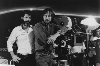 George Lucas and Steven Spielberg on set for "Indiana Jones and the Temple of Doom", 1984 Paramount  File Reference # 32603_352THA