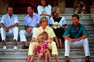 Prince Charles, Prince of Wales and Diana, Princess of Wales relax with Prince William, Prince Harry and the Spanish Royal Family on their holiday in Majorca on August 10, 1987.
