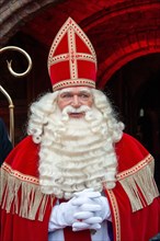 ENSCHEDE, THE NETHERLANDS - NOV 13, 2021: Portrait of the the dutch Santa Claus called 'Sinterklaas' while he is arriving in town.