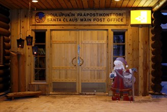 Finland, Lapland, Rovaniemi, 'Santa of Claus Village', post, wooden door Scandinavia, Finnish Lapland, close polar circle, town, 'Santa of Claus Office', house, post, 'Santa of Claus Main Post Office'...