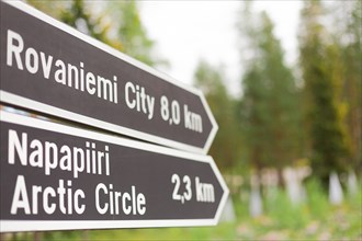 Roadsign for the Arctic Circle and Rovaniemi City