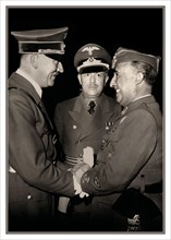 Adolf Hitler and Eberhard von Stohrer greeting General Franco at Hendaye, moments after arriving from his train at around 15:15. 23rd October 1940 Francisco Franco (1892 - 1975) Spanish general and di...
