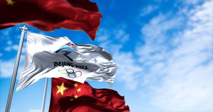 Beijing, China, October 2021: The flag of Beijing 2022 waving in the wind with the national flags of China. winter olympics games are scheduled to tak