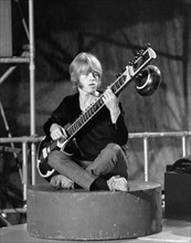 ROLLING STONES  - Brian Jones playing sitar on Paint It Black in May 1966. Photo Tony Gale