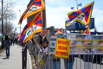 Tibetans express their displeasure with the alleged Chinese occupation of Tibet