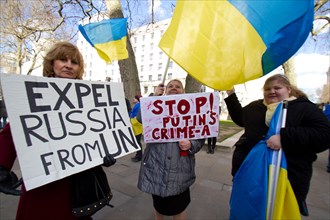 Westminster London , UK. 22nd March 2014. Ukranian protesters continue to hold a 24 hour shift protest outside Downing following the Military intervention and annextaion of Crimea by Russian forces, C...