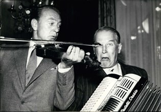 Jun. 30, 1957 - Maurice Chevalier and Gary Cooper Giving a Humorous Concert