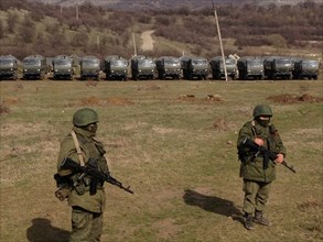 Crimea, Ukraine. 10th Mar, 2014. Russian forces patrol near Perevalne, in Crimea, Ukraine, on March 10, 2014, in the days before a referendum on whether to leave Ukraine and join Russia. After initial...