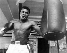 Florida, USA. 17th May, 2014. May 17, 1967: Muhammad Ali punches the bag. Credit:  The Palm Beach Post/ZUMA Wire/Alamy Live News