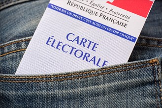 French electoral card in the rear pocket of a jeans, 2017 presidential elections concept