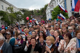 Sevastopol, Crimeans are viewing of the columns of the Parade of Winners on the Nakhimov Avenue of Sevastopol city, Crimea Republic 9 of May, 2014