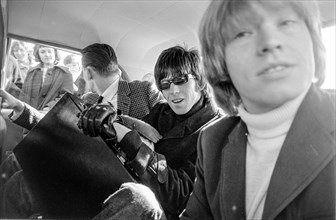 STOCKHOLM 1965 Keith Richards, middle, and Brian Jones, right, of the rock group the Rolling Stones in a car after arriving at Bromma Airport in Stockholm 1965. Photo: Björn Larsson Ask / SE/ TT / Kod...