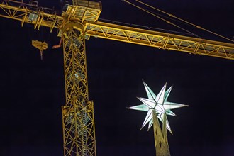 Twelve-pointed star is illuminated from the top of one of the towers of the Basilica of the Sagrada Familia.The newly installed star at the tower of the Virgin Mary of the Basilica of the Sagrada Fami...