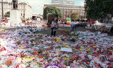 Princess Diana Death 31 August 1997 Flowers being removed from George Square Glasgow Coucil workers men collecting bouquets of flowers