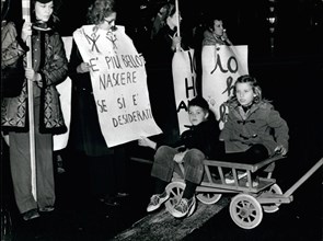 Jan. 01, 1975 - During a manifestation to introduce the abortion in Italy, a woman carried her sons bringing a poster: ''It is better born if we are wished'