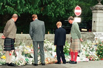 Royal Family, Balmoral Estate, Scotland, 5th September 1997.   After attending a private service at Crathie Church, Royal family stop to look at floral tributes left for Princess Diana, at the gates o...