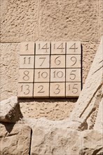 BARCELONA, SPAIN - MARCH 10: Magic number square on the passion facade of Sagrada Familia church, Barcelona, March 10, 2013.