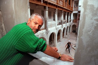 Miami Beach, USA. 16th Mar, 1993. Gianni Versace looking out from a second story window overlooking his patio in a 1997 file image. Credit: Marice Cohn Band/Miami Herald/TNS/Alamy Live News