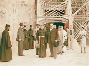 Monsieur & Madame Edouard Herriot visit to Jerusalem, May 11, 1938. M. Herriot and party in front of Church of Holy reimagined
