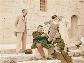Monsieur & Madame Edouard Herriot visit to Jerusalem, May 11, 1938. Mr. Herriot & party in front of Church of Holy reimagined