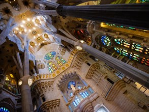 BARCELONA, SPAIN - CIRCA MAY 2018: Interior of La Sagrada Familia, a famous Cathedral in Barcelona designed by Antoni Gaudi. View of the interior colu