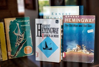 Heminway's Old Man and The Sea books in various translations at his room in Ambis Mundos Hotel