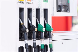 STRASBOURG - APR 30: Petrol pumps filling nozzles at gas station in Strasbourg on April 30. 2018 in France