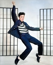 Elvis Presley performing Jailhouse Rock, muscial movie 1957. Colorized photo.