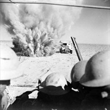 A mine explodes close to a British artillery tractor during 2nd battle of El Alamein  during the WW2 North Africa campaign
