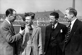 16 year old Jeff Whitefoot making a BBC recording at Old Trafford for Childrens Newsreel. 20th April 1950.