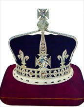 Queen Elizabeth’s crown, made by Garrard, was the first to be mounted in platinum. it includes a circlet used by Queen Victoria and is emblazoned by the Koh-I-Noor diamond. Crown of Queen Elizabeth Th...