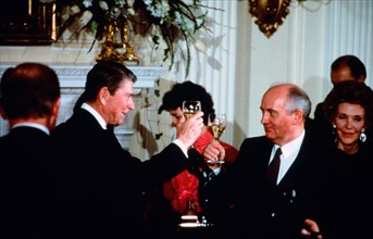 Reagan and Gorbachev toast during a state dinner at the Reagan Gorbachev Summit in December 1987.