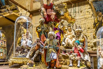 NAPLES, ITALY - JANUARY 4, 2020: light is enlightening Christmas Nativity scenes market in San Gregorio Armeno street