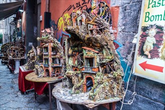Naples, Italy - September 9, 2019: Nativity scene for sale (manger scene, crib, presepio, presepe, Bethlehem), a Christian tradition, on a street in N