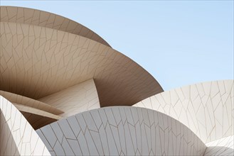 National Museum of Qatar, designed by French architect Jean Nouvel. Design is inspired by desert roses, flower-like formation.