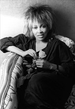 Singer Tina Turner on tour photographed in her hotel room in Paris