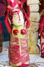 A dancer carved from radishes for Noche de Rabanos festival, Oaxaca, Mexico.