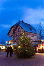 Christmas market at night Riquewihr,Alsace, France.