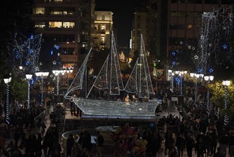 Athens, Greece. 9th Dec, 2016. Athenians gather at Syntagma square, just across the parliament, to watch the lighting of the municipality's Christmas Boat, an old Greek tradition. Credit:  Nikolas Geo...