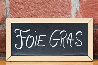 Foie gras on a blackboard